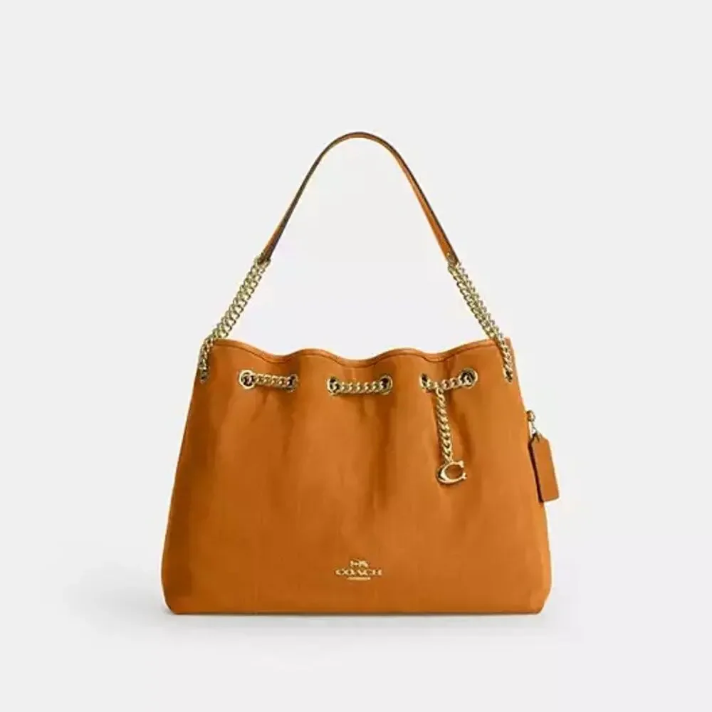NEW‼️Coach Evelyn Shoulder Bag With Quilting And Charm CET33 suede/Gold/Marigold
